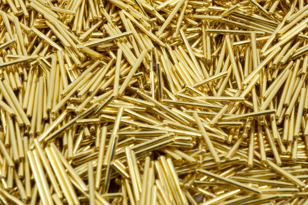 A macro photo filled with gold plated Mill Max pins.