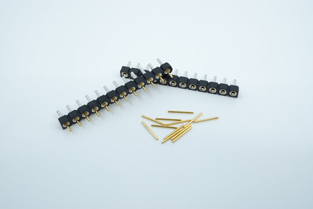  Two rows of Mill Max low profile sockets, with one row filled with gold plates pins.